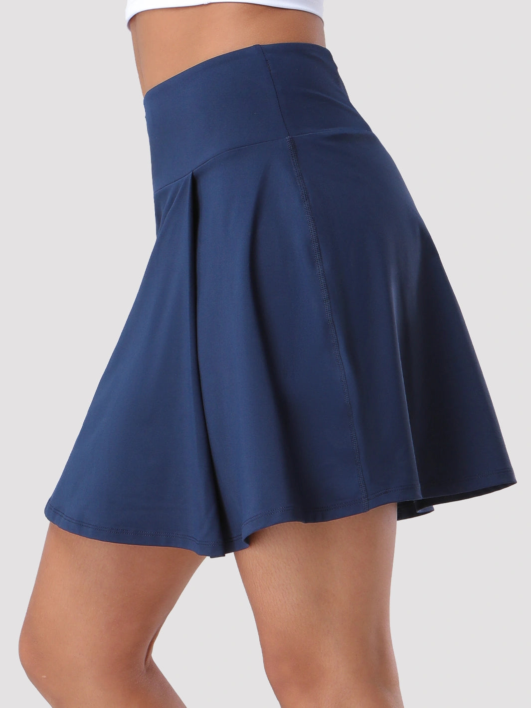Damen UPF 50+ Tennisrock mit hoher Taille, Falten und integrierten Shorts