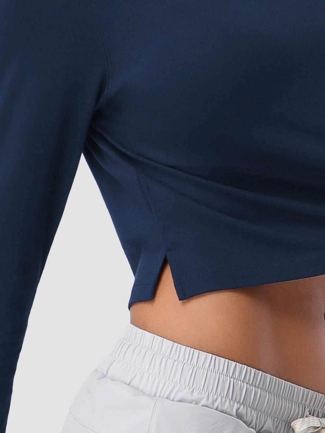 Top a manica lunga cropped e comodo da donna