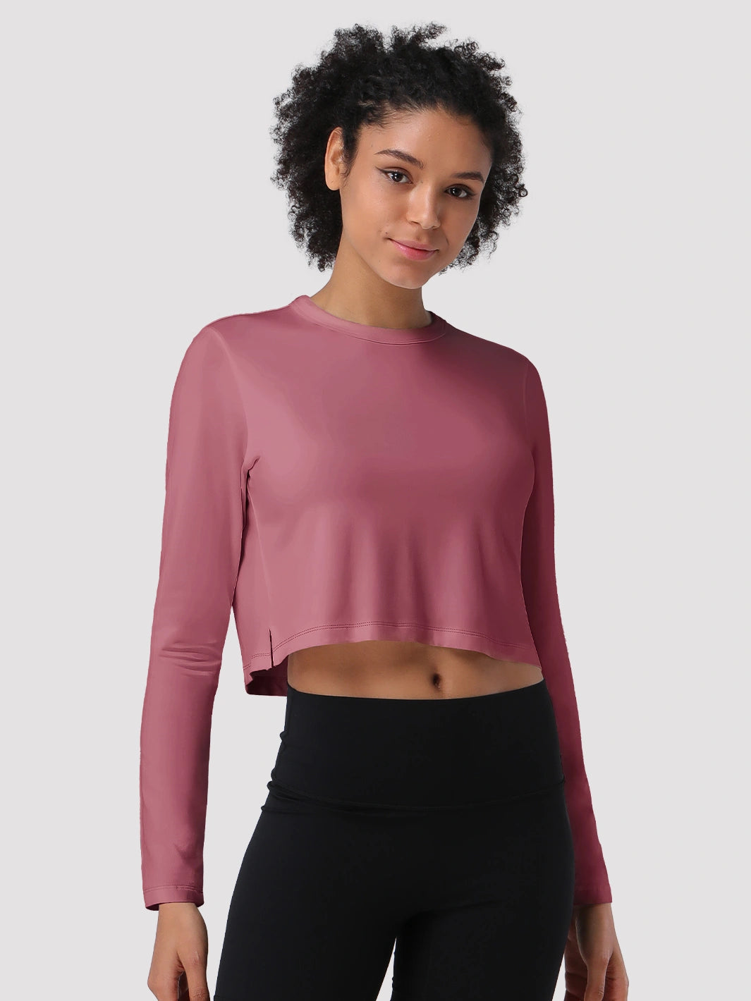 Top a manica lunga cropped e comodo da donna