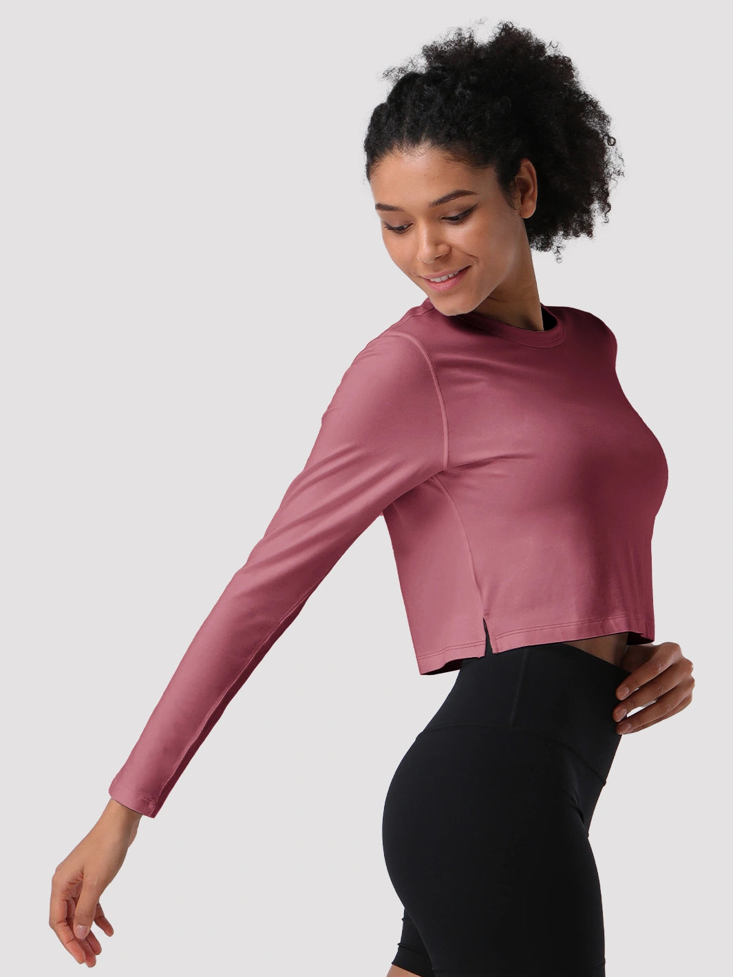 Top a manica lunga cropped e comodo da donna