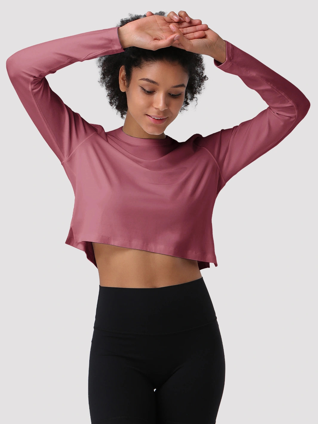 Top a manica lunga cropped e comodo da donna