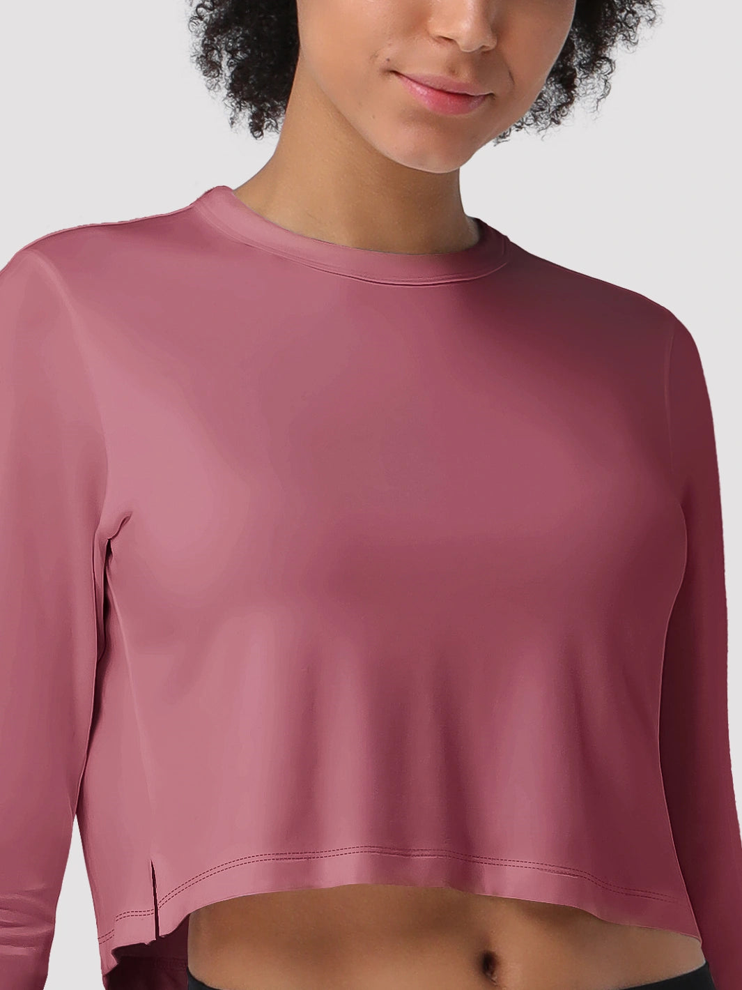 Top a manica lunga cropped e comodo da donna