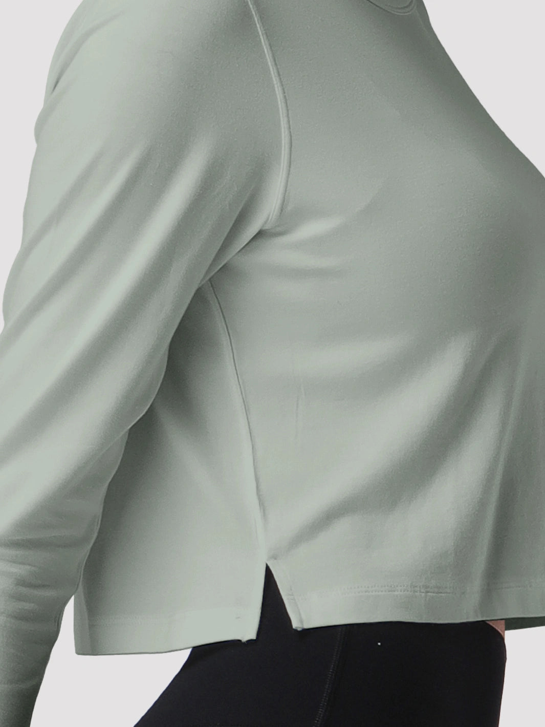 Top a manica lunga cropped e comodo da donna