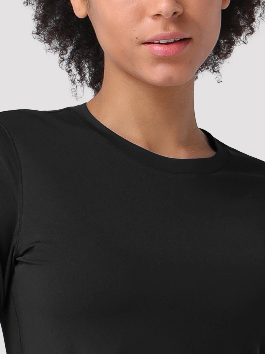 Camiseta de protección solar UPF 50+ con dobladillo alto-bajo para mujer