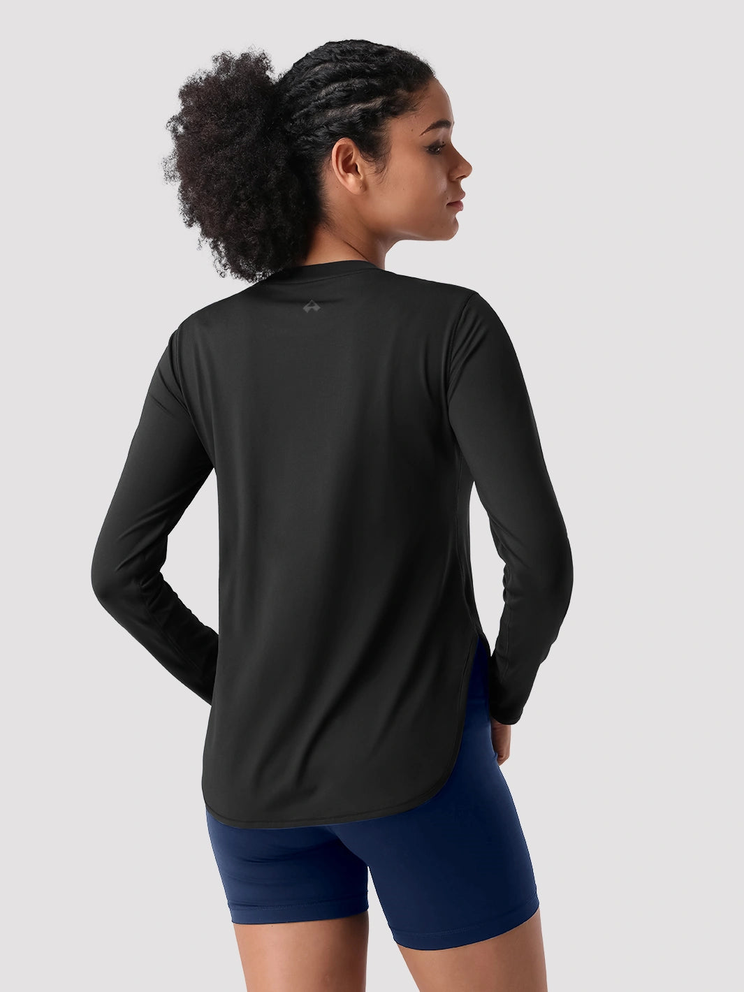 Camiseta de protección solar UPF 50+ con dobladillo alto-bajo para mujer