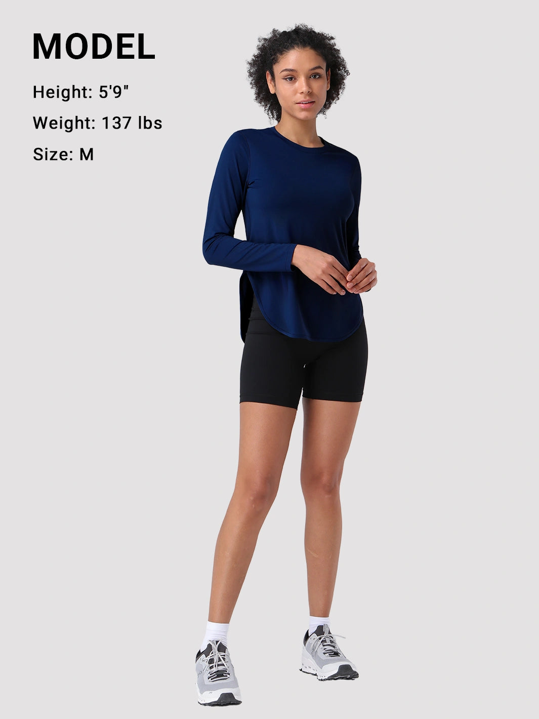 Camiseta de protección solar UPF 50+ con dobladillo alto-bajo para mujer