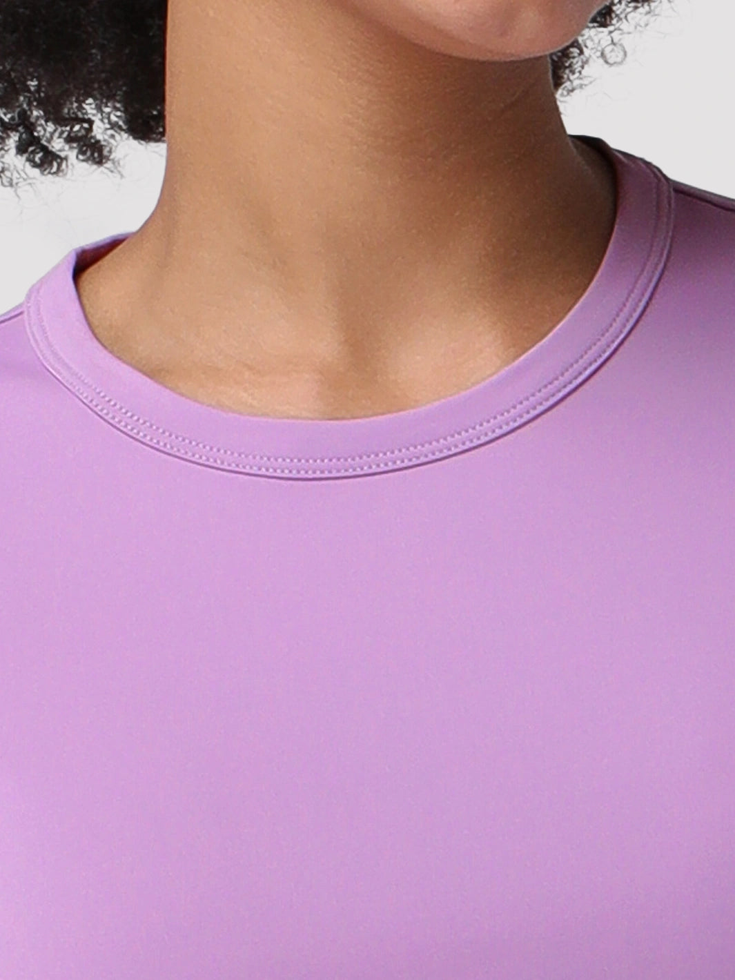 Camiseta de protección solar UPF 50+ con dobladillo alto-bajo para mujer