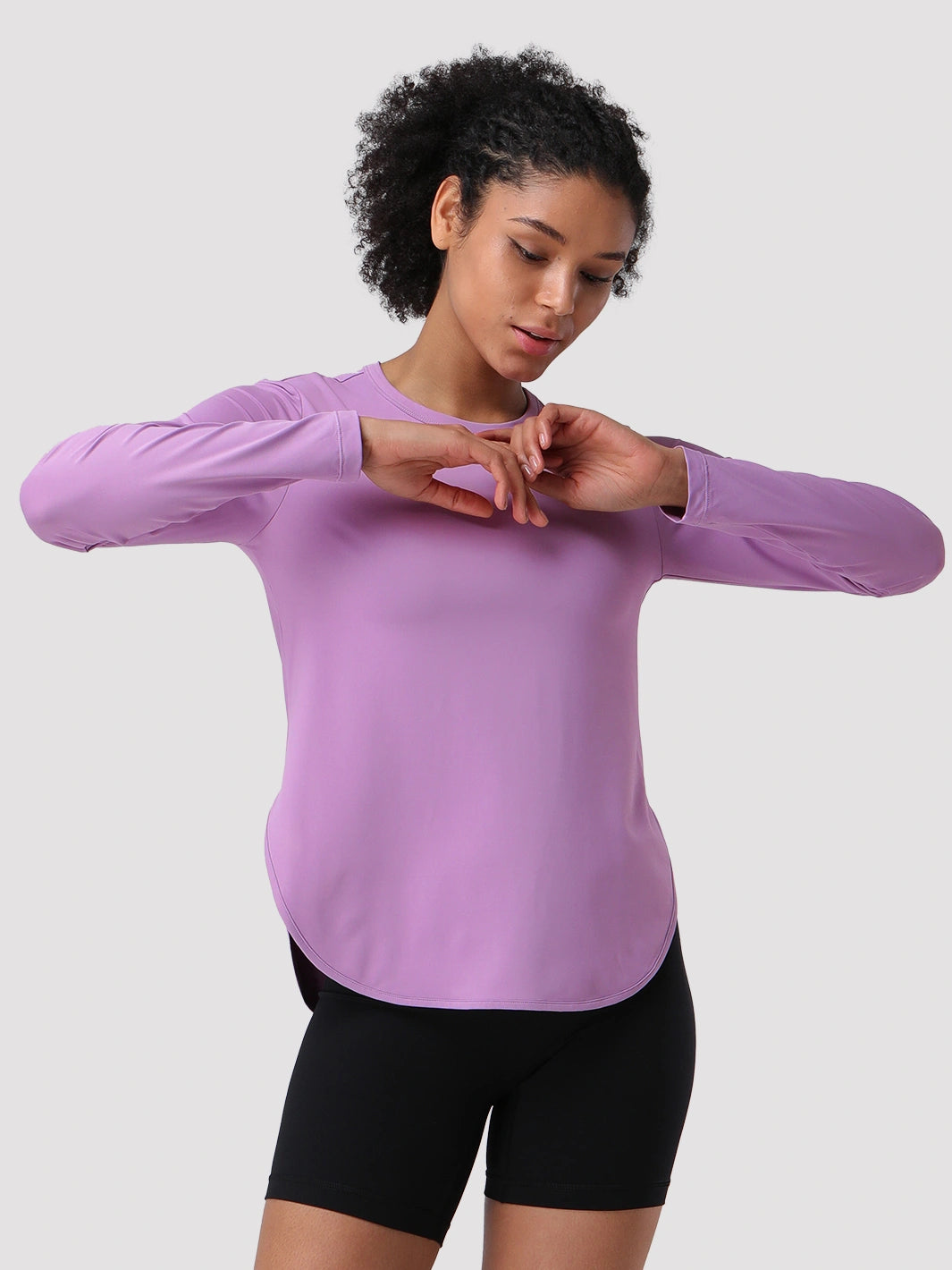 Camiseta de protección solar UPF 50+ con dobladillo alto-bajo para mujer