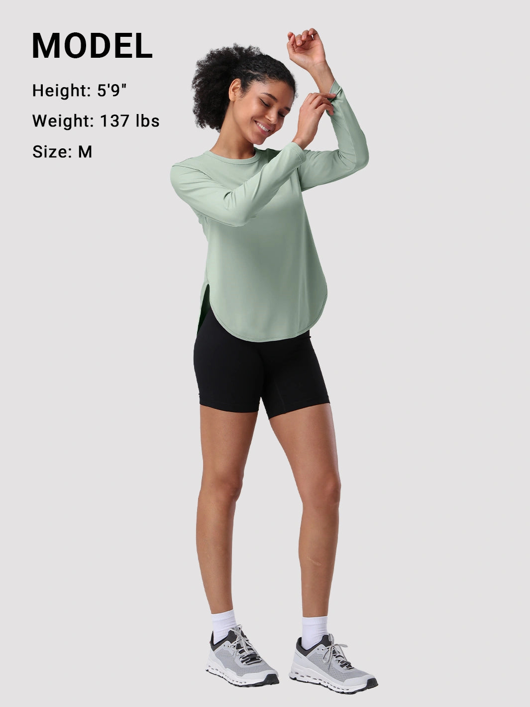 Camiseta de protección solar UPF 50+ con dobladillo alto-bajo para mujer