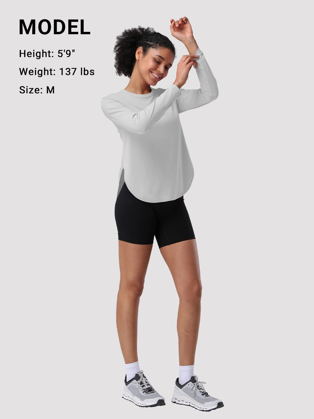 Camiseta de protección solar UPF 50+ con dobladillo alto-bajo para mujer