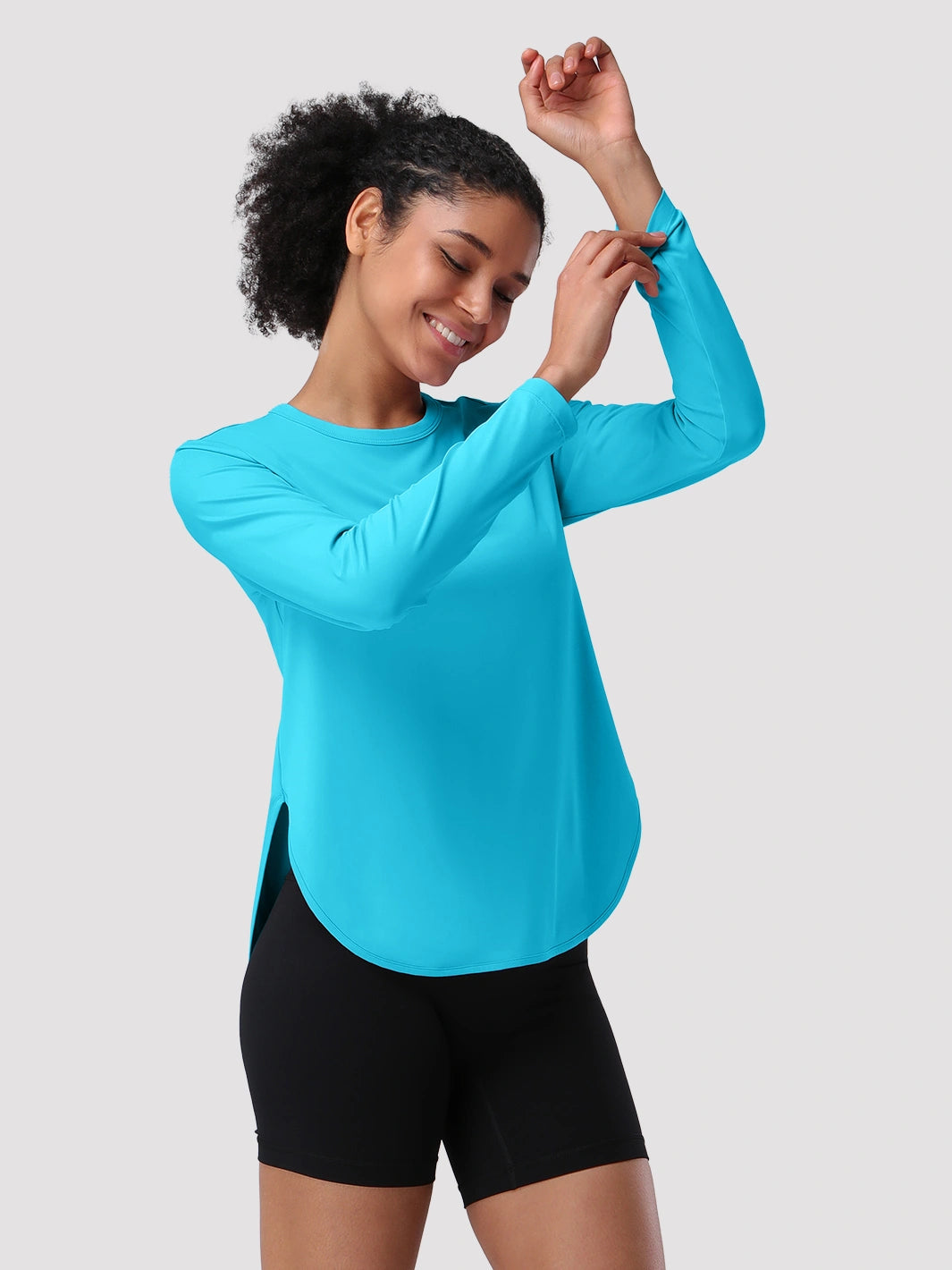Camiseta de protección solar UPF 50+ con dobladillo alto-bajo para mujer