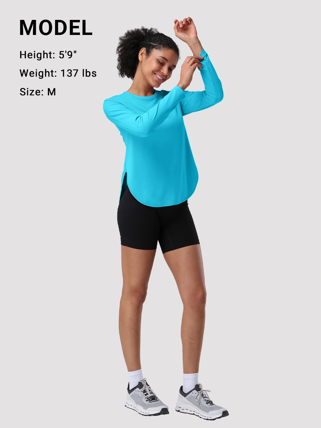 Camiseta de protección solar UPF 50+ con dobladillo alto-bajo para mujer