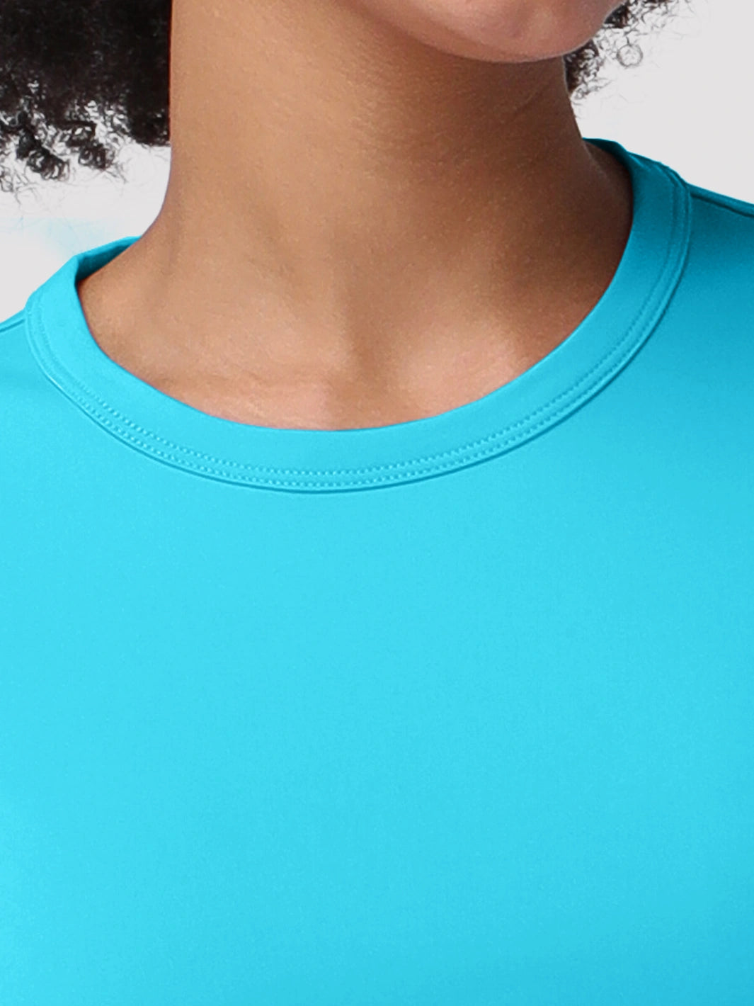 Camiseta de protección solar UPF 50+ con dobladillo alto-bajo para mujer