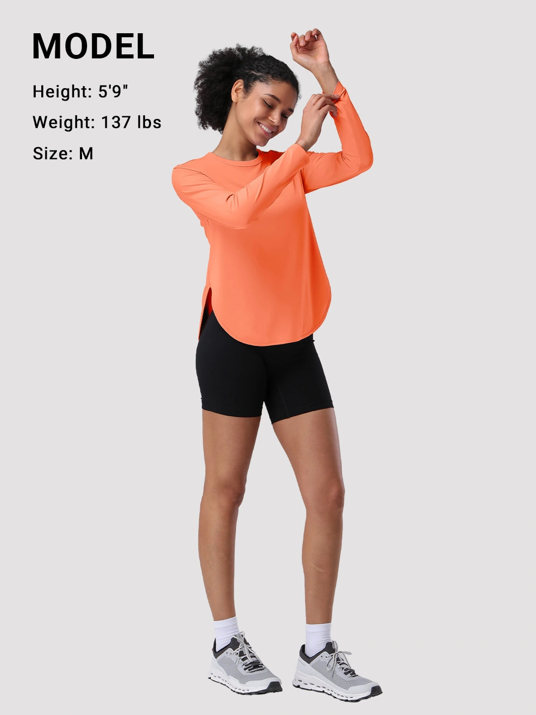 Camiseta de protección solar UPF 50+ con dobladillo alto-bajo para mujer