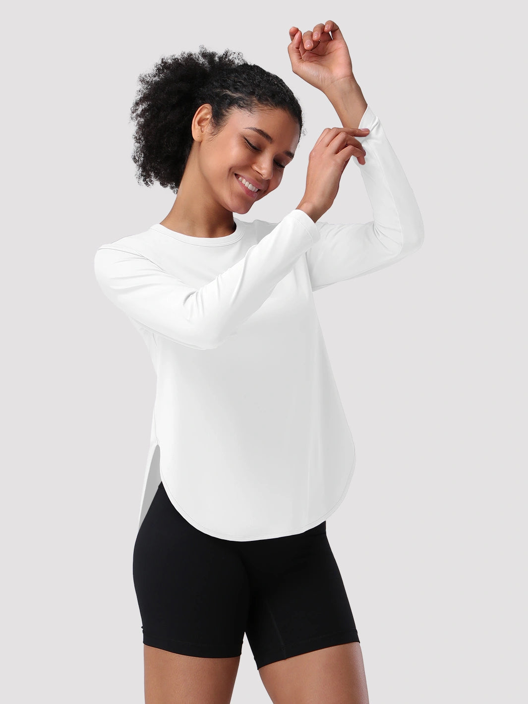 Camiseta de protección solar UPF 50+ con dobladillo alto-bajo para mujer