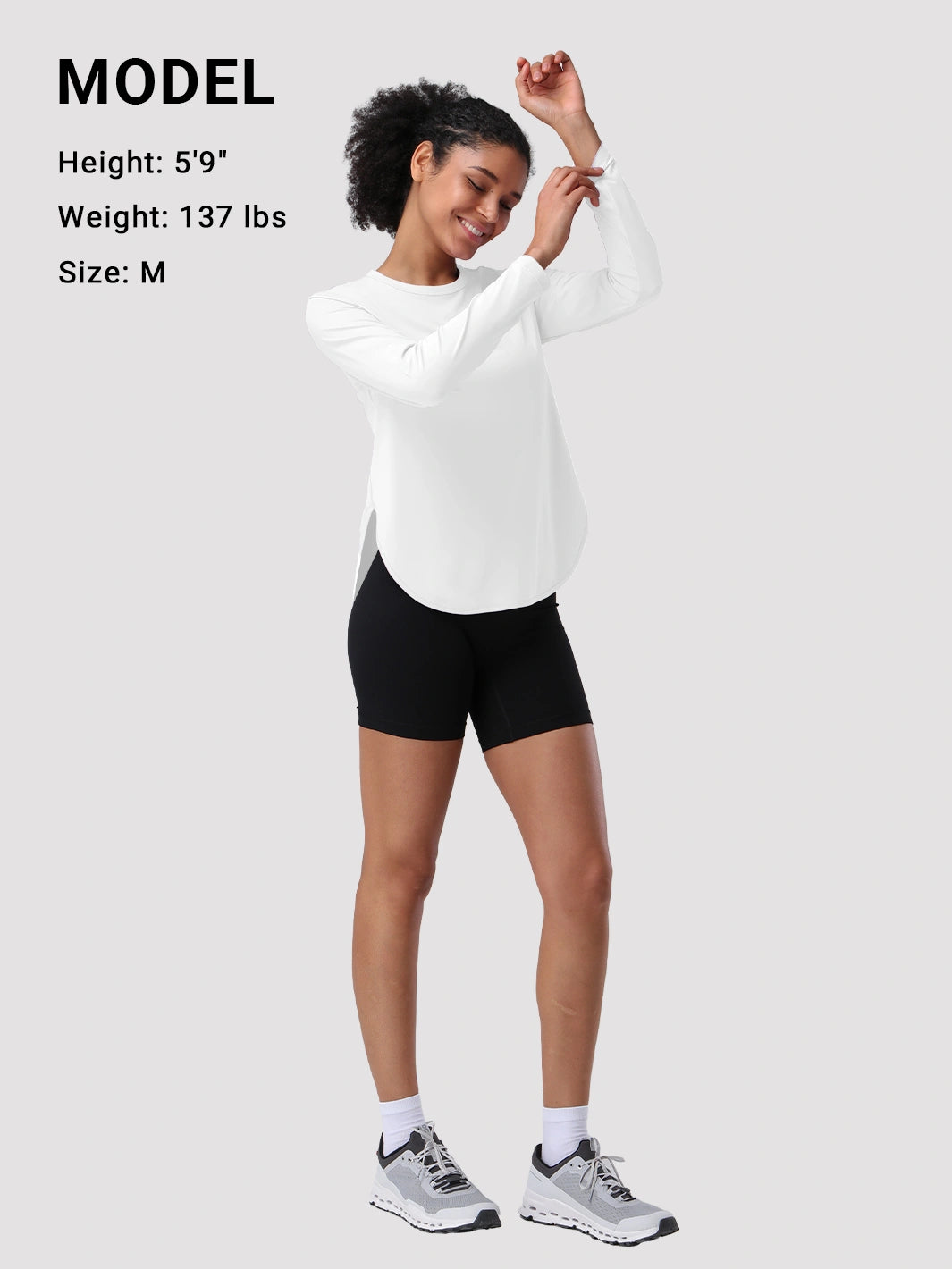Camiseta de protección solar UPF 50+ con dobladillo alto-bajo para mujer